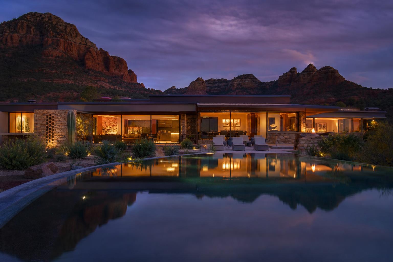 The Mesa House at dusk — custom home in Sedona